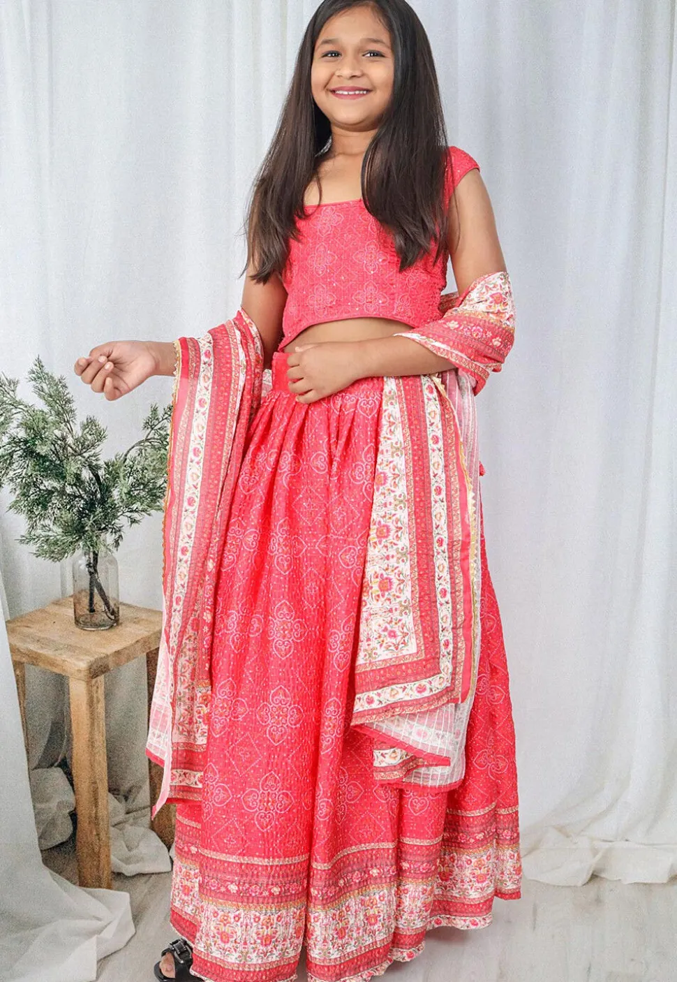 Bandhej Printed Chinon Chiffon Lehenga in Coral Pink