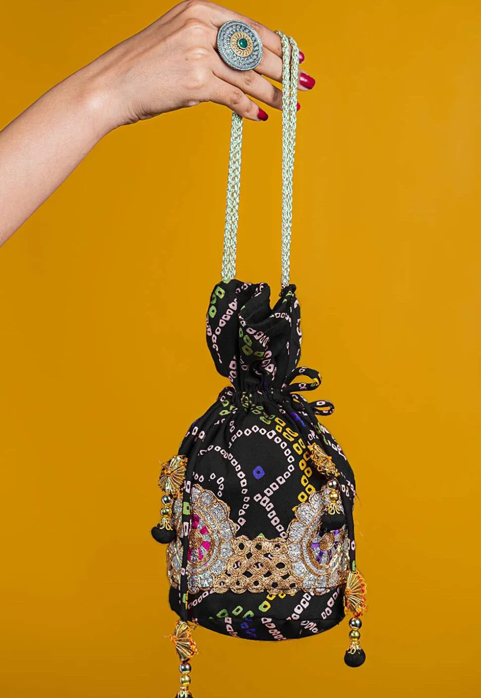 Bandhej Printed Crepe Potli Bag in Black