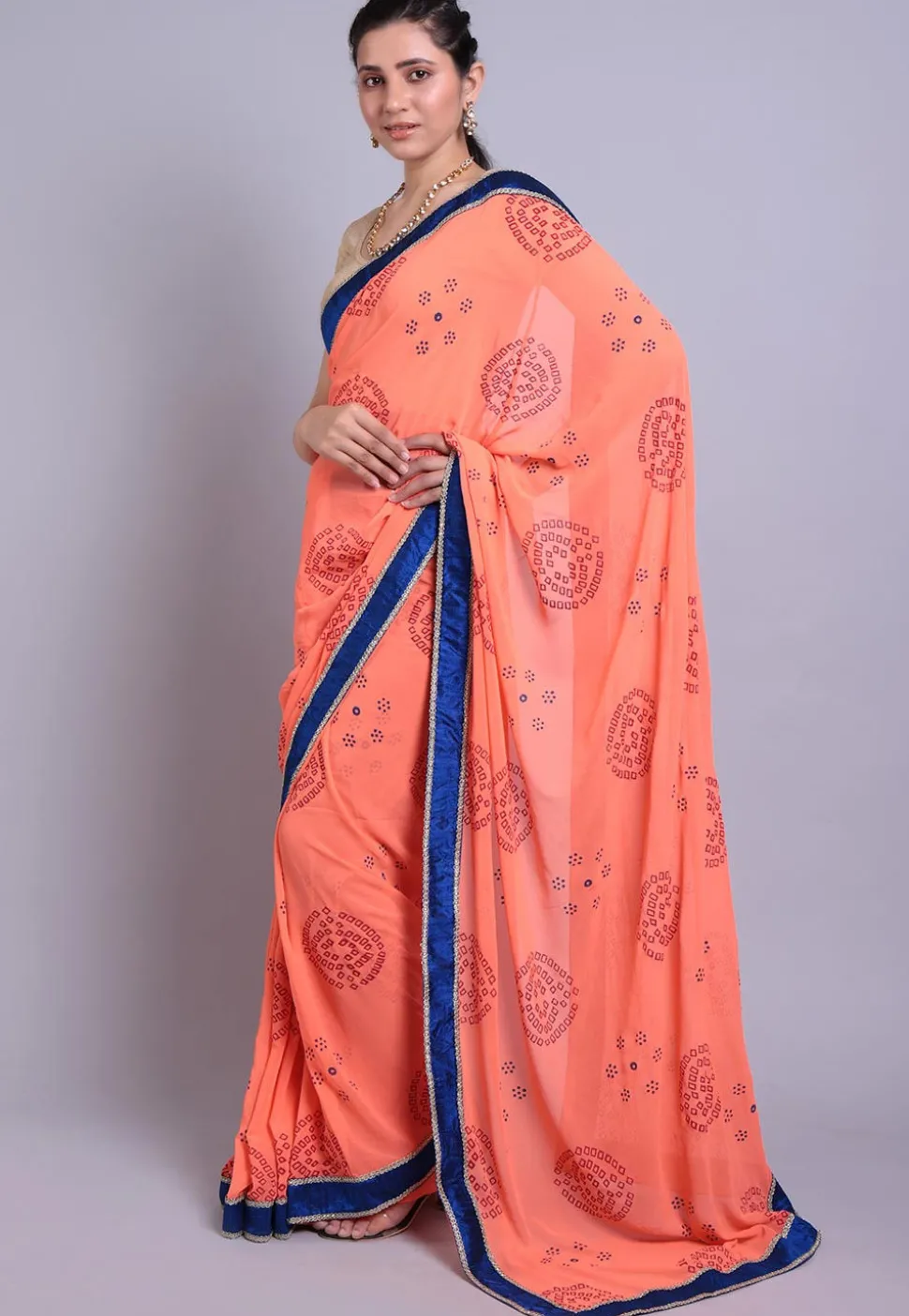 Bandhej Printed Georgette Saree in Peach
