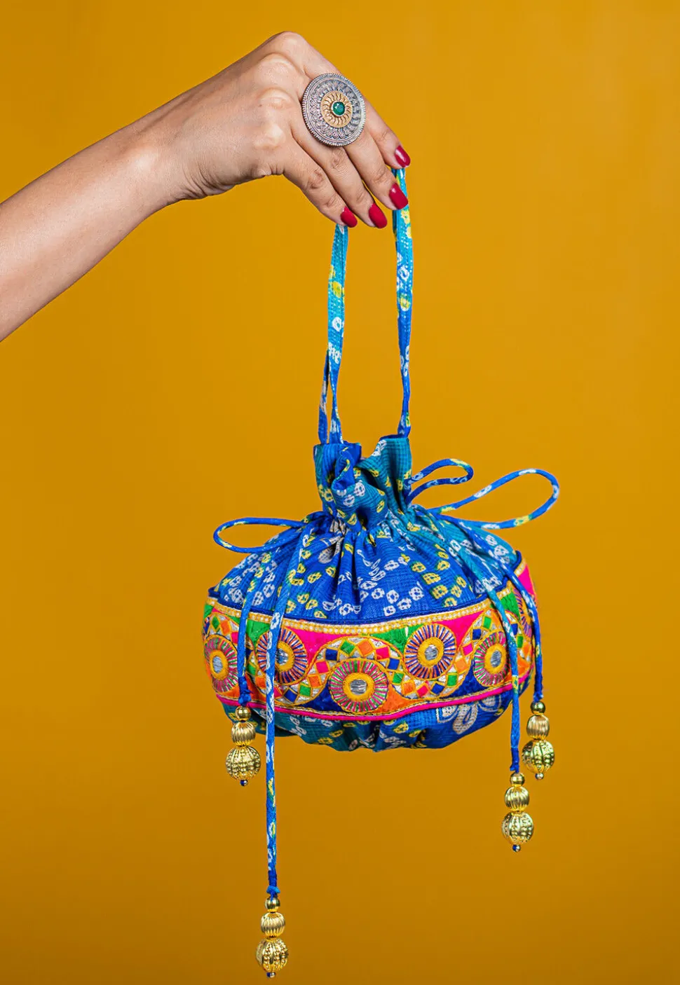 Bandhej Printed Kota Silk Potli Bag in Shaded Blue