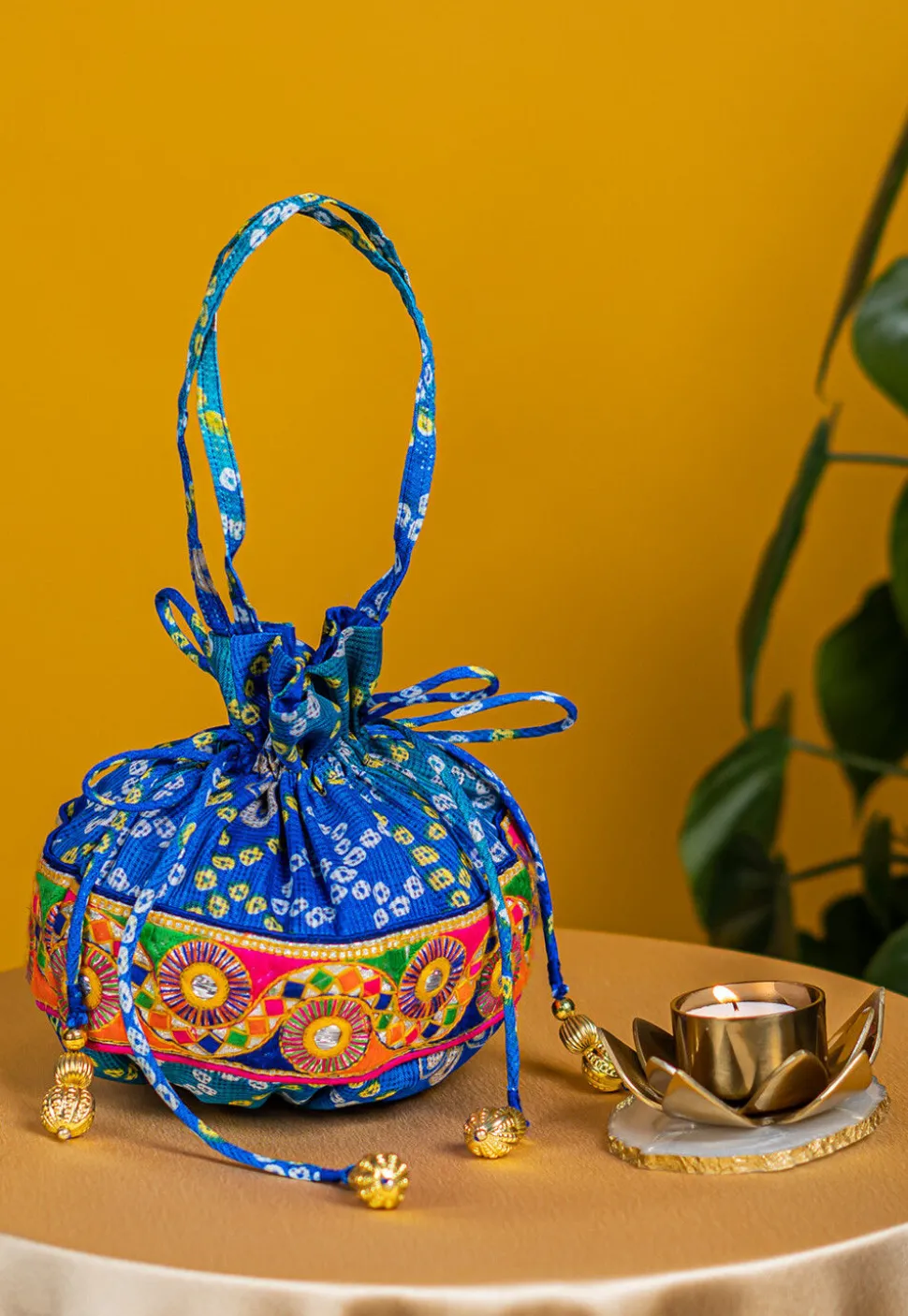 Bandhej Printed Kota Silk Potli Bag in Shaded Blue