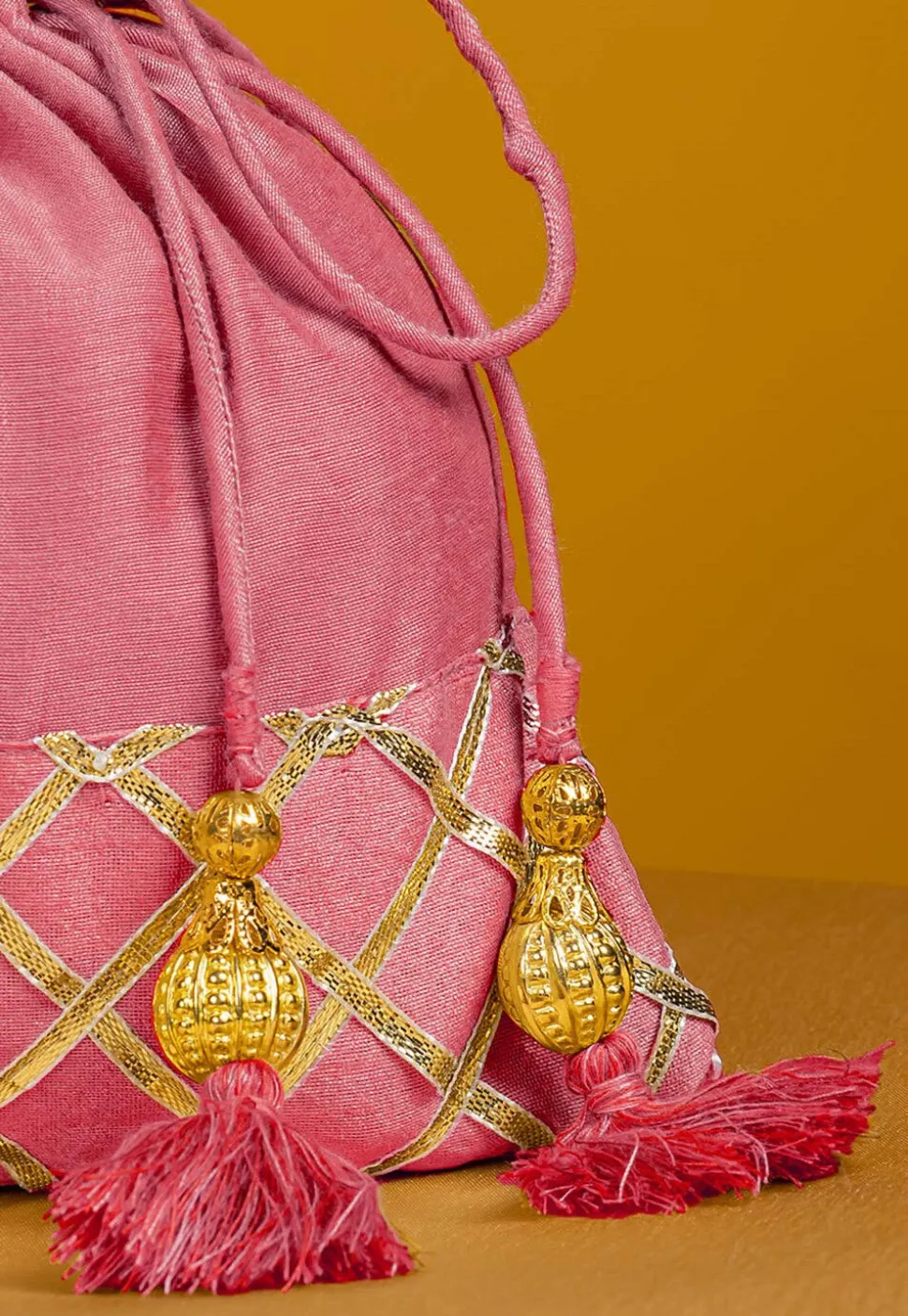 Embellished Art Silk Potli Bag in Pink