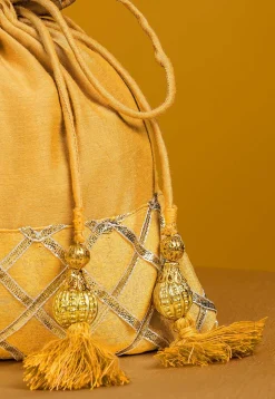 Embellished Art Silk Potli Bag in Yellow