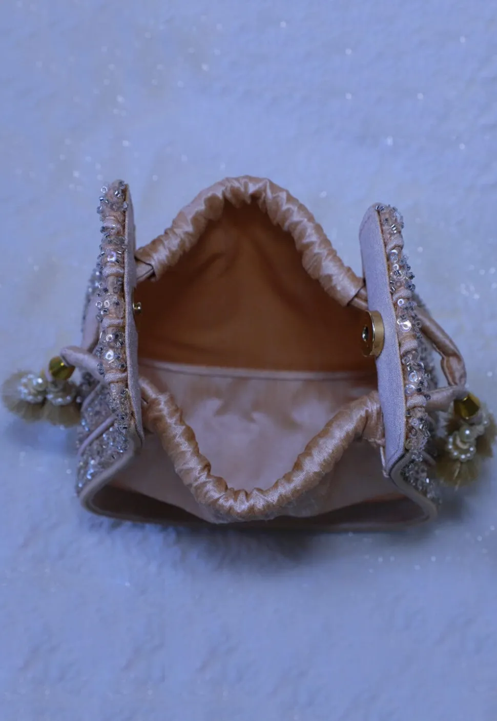 Embellished Art Silk Potli Bag in Peach