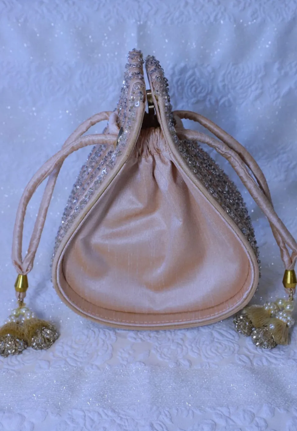 Embellished Art Silk Potli Bag in Peach