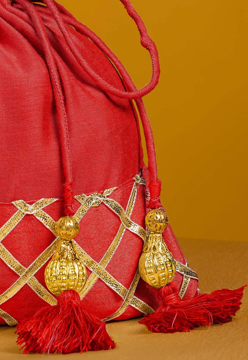 Embellished Art Silk Potli Bag in Coral Red