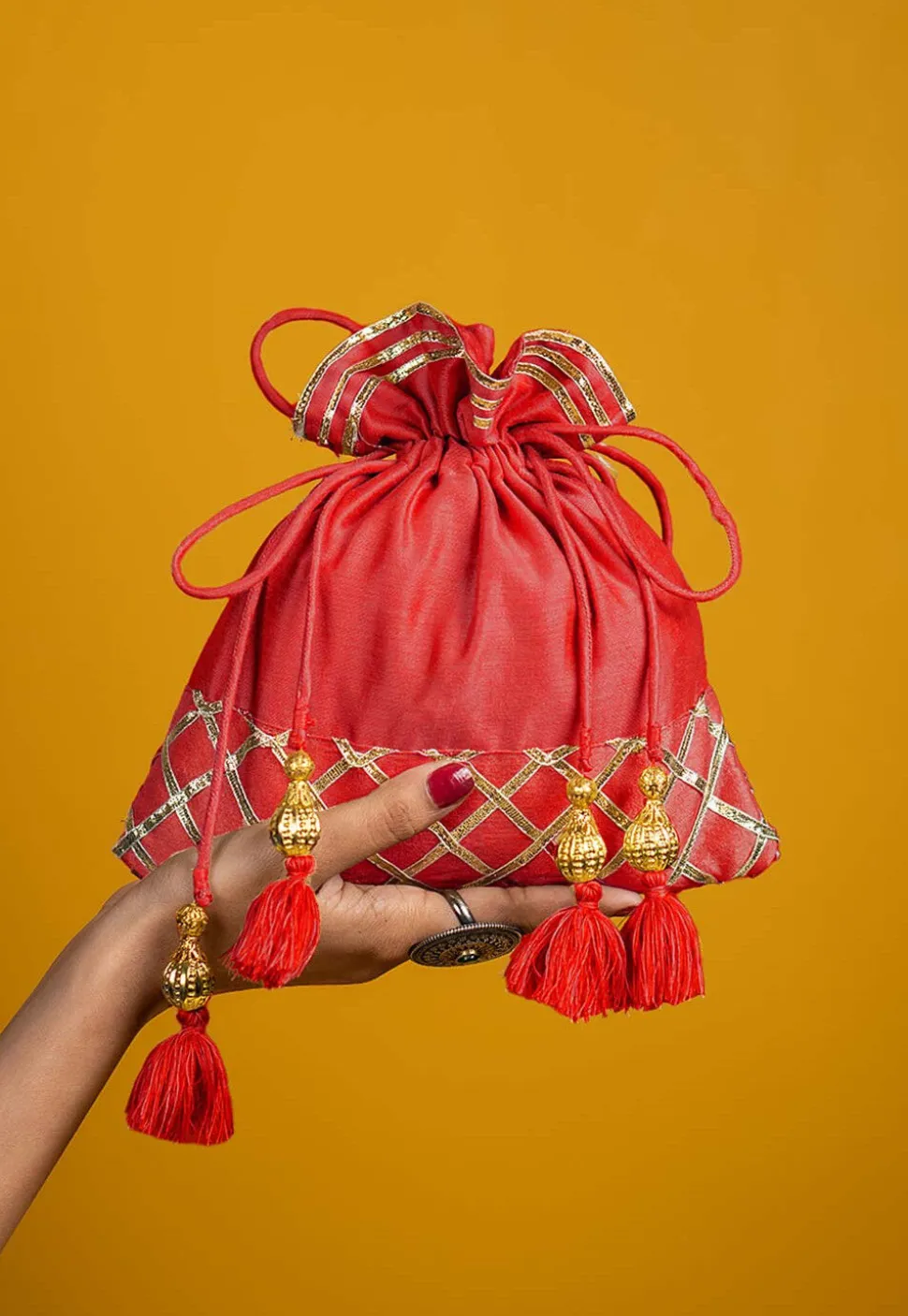 Embellished Art Silk Potli Bag in Coral Red
