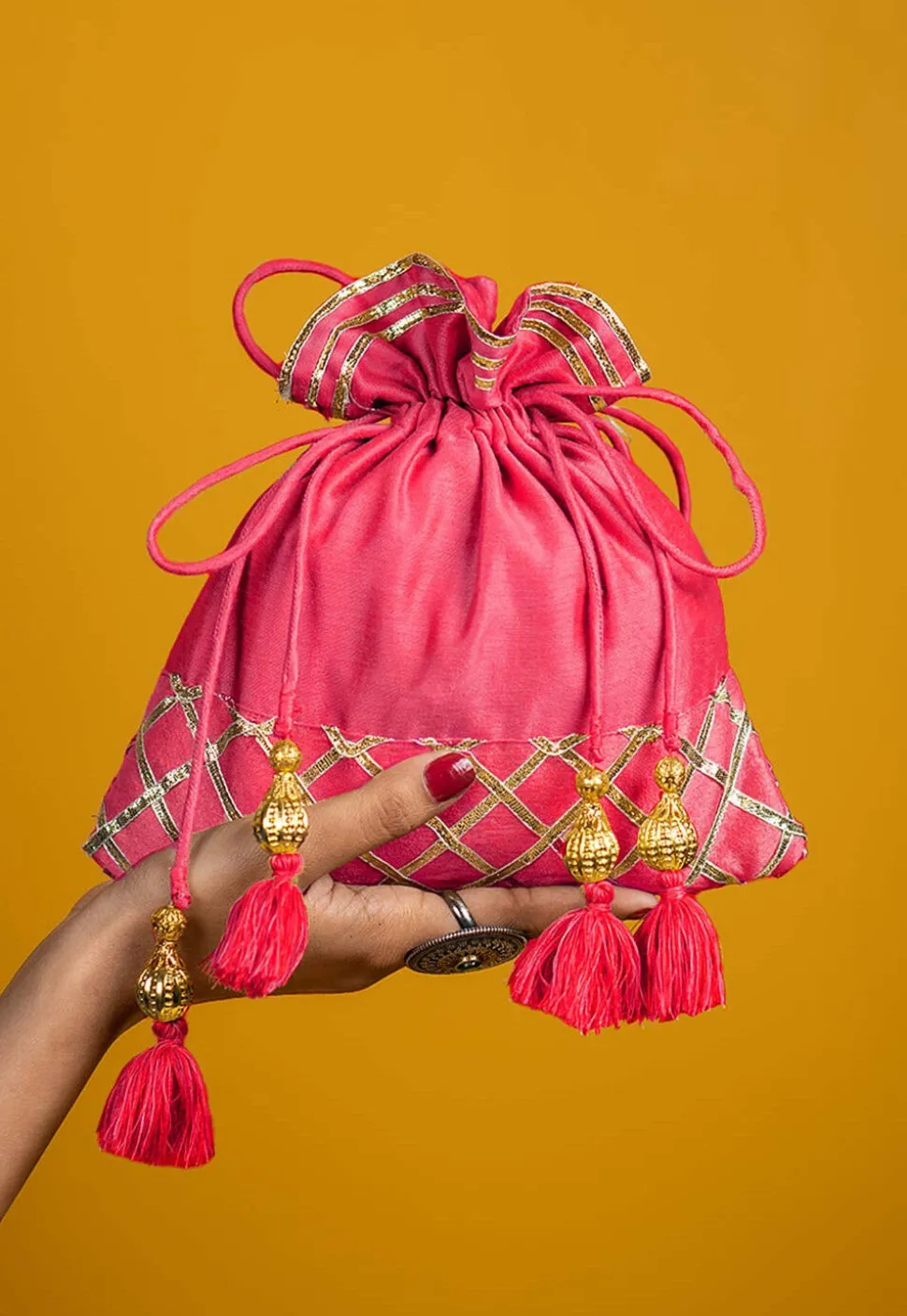 Embellished Art Silk Potli Bag in Pink