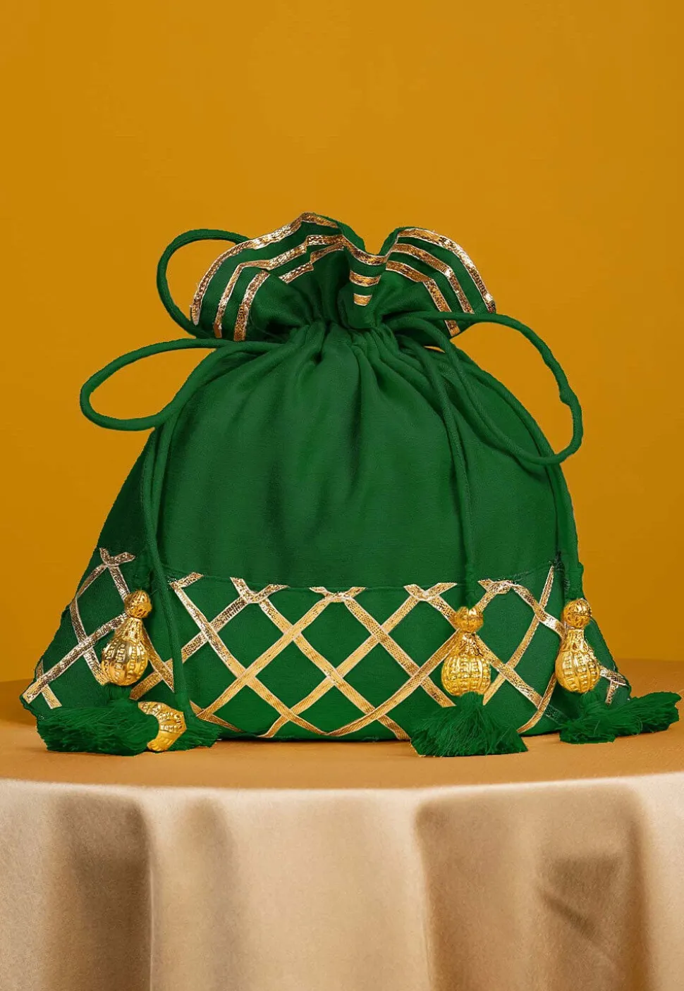 Embellished Art Silk Potli Bag in Dark Green