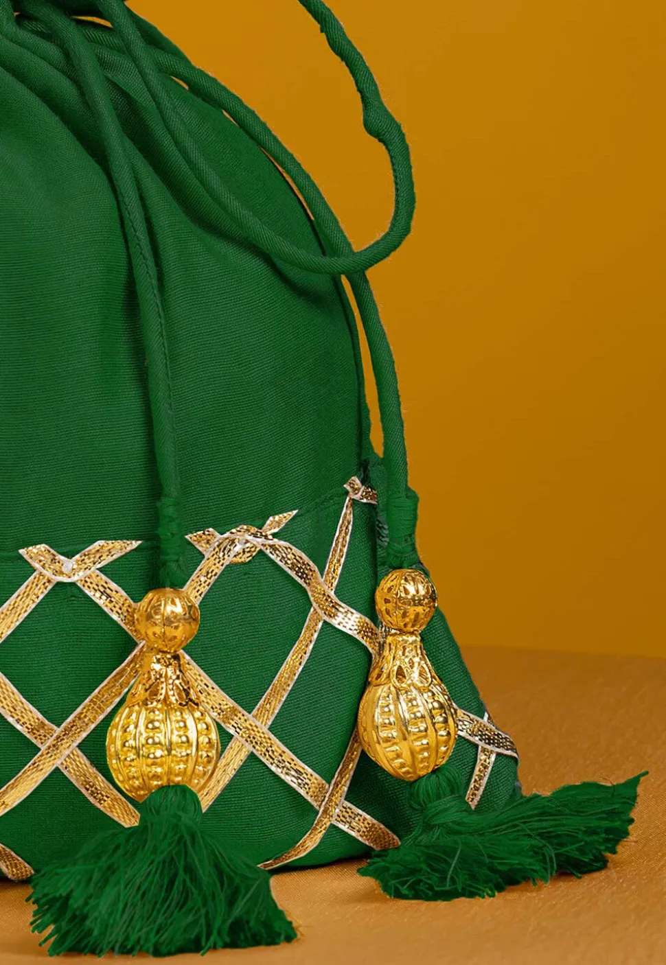 Embellished Art Silk Potli Bag in Dark Green