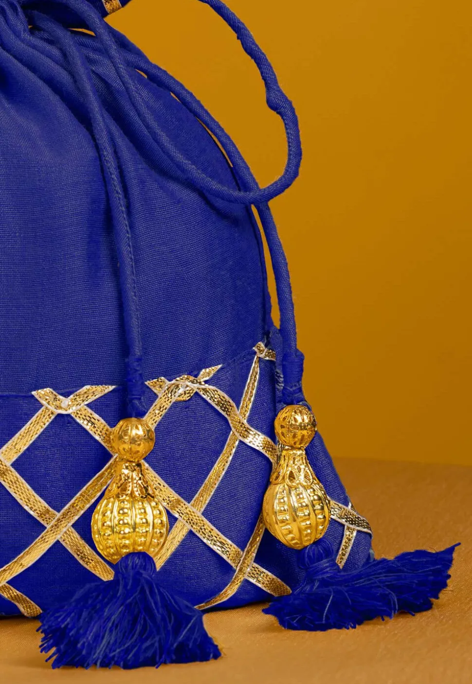 Embellished Art Silk Potli Bag in Royal Blue