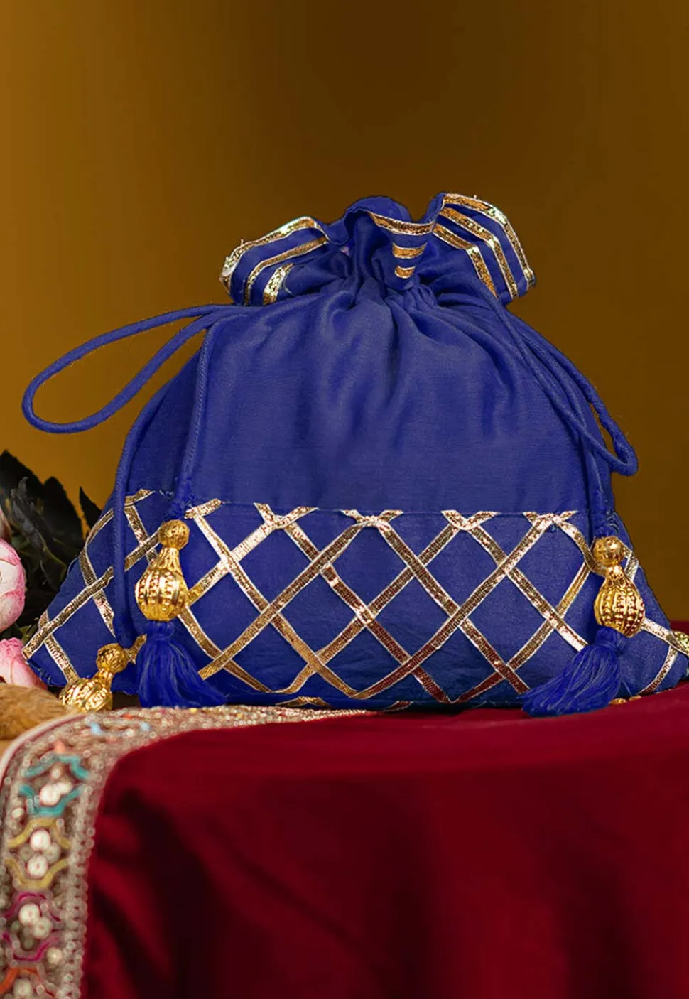 Embellished Art Silk Potli Bag in Royal Blue