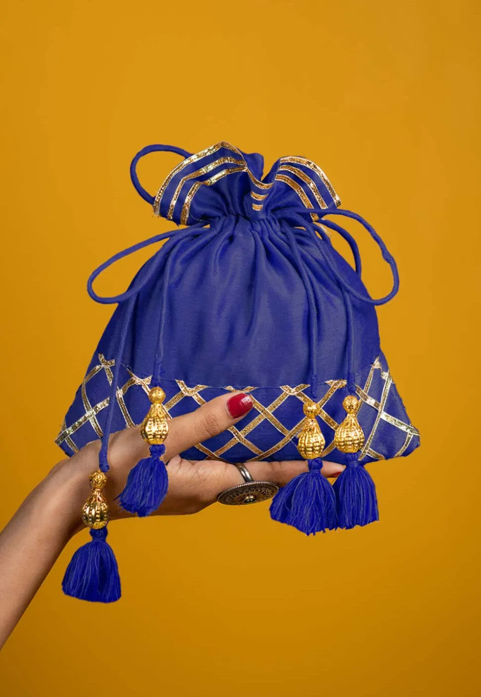 Embellished Art Silk Potli Bag in Royal Blue
