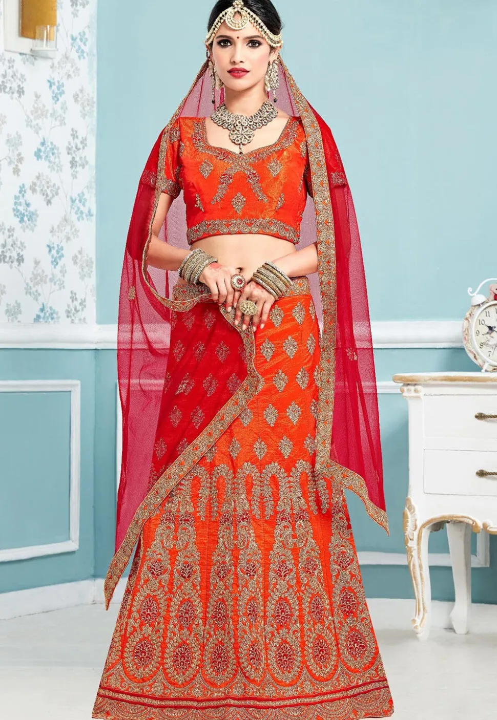 Embroidered Art Silk Lehenga in Orange