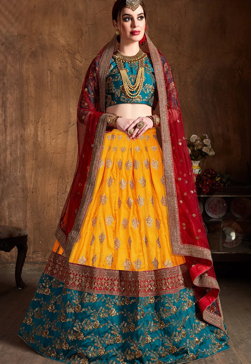 Embroidered Art Silk Lehenga in Yellow and Teal Blue