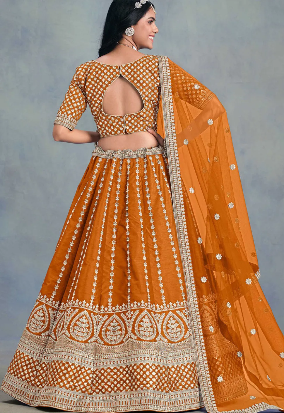 Embroidered Art Silk Lehenga in Orange