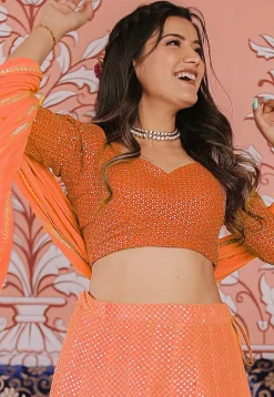 Embroidered Art Silk Lehenga in Shaded Orange