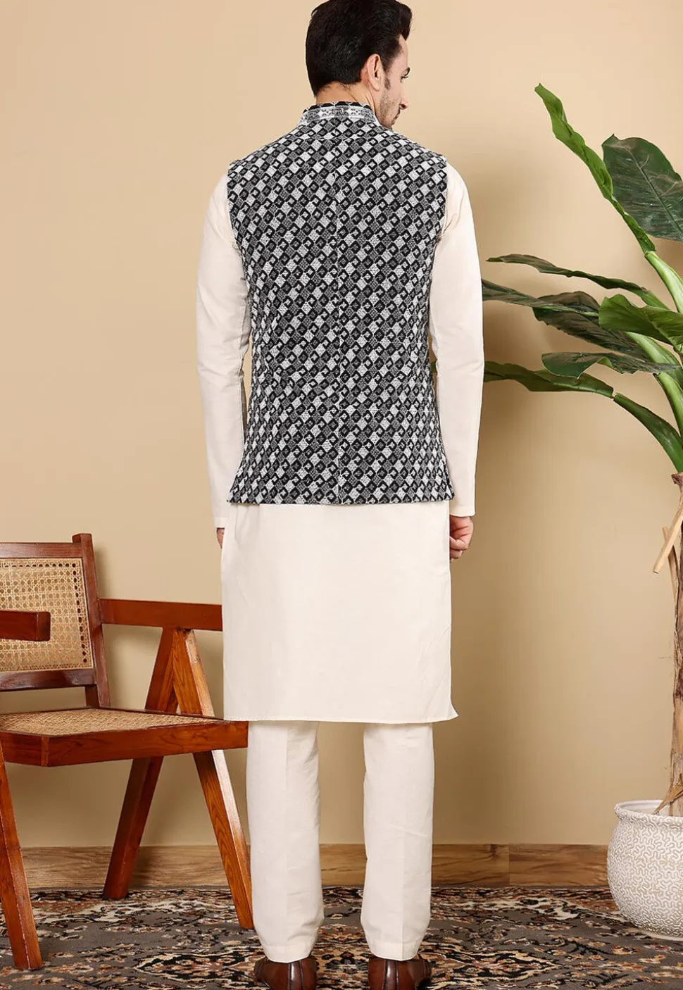 Embroidered Art Silk Nehru Jacket in Black