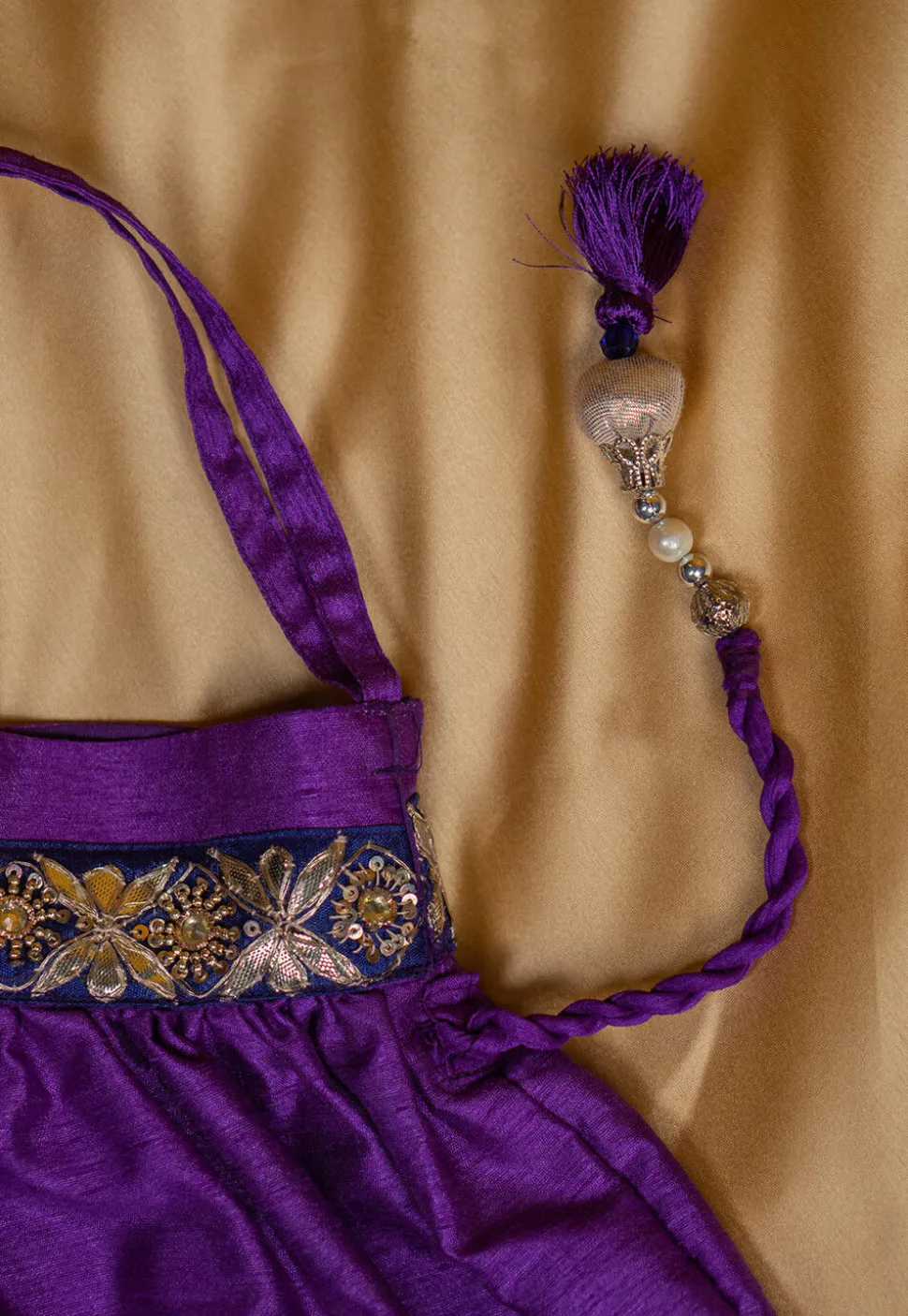 Embroidered Art Silk Potli Bag in Purple