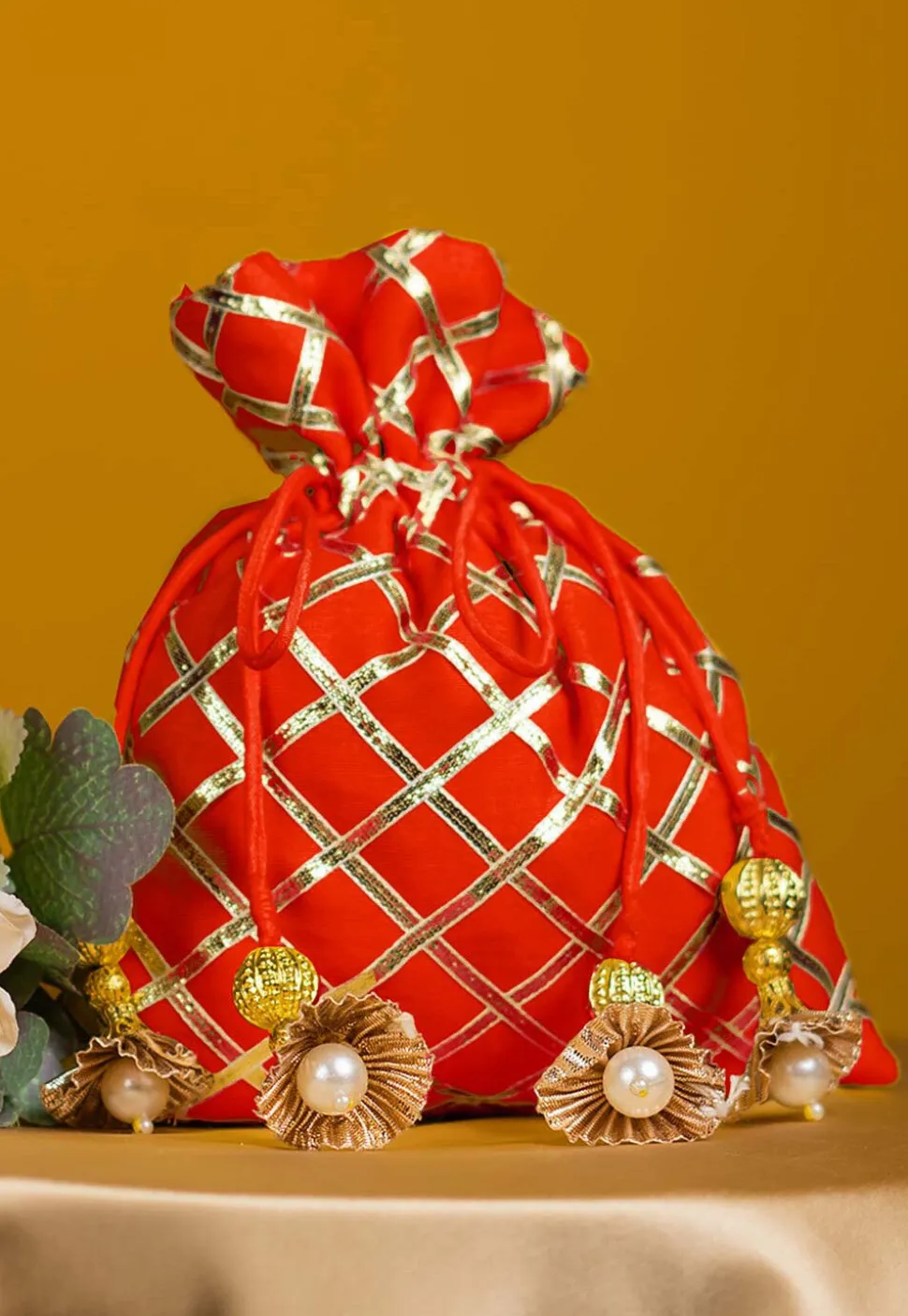 Embroidered Art Silk Potli Bag in Orange