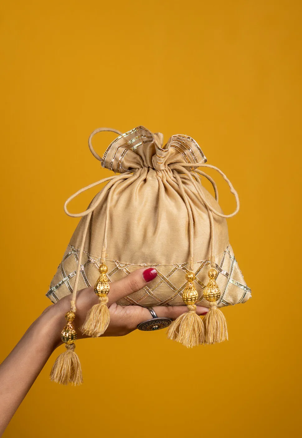 Embroidered Art Silk Potli Bag in Beige