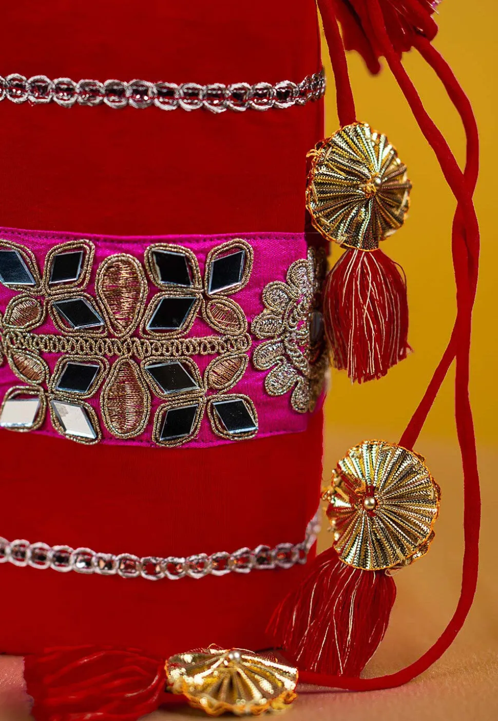 Embroidered Art Silk Potli Bag in Red
