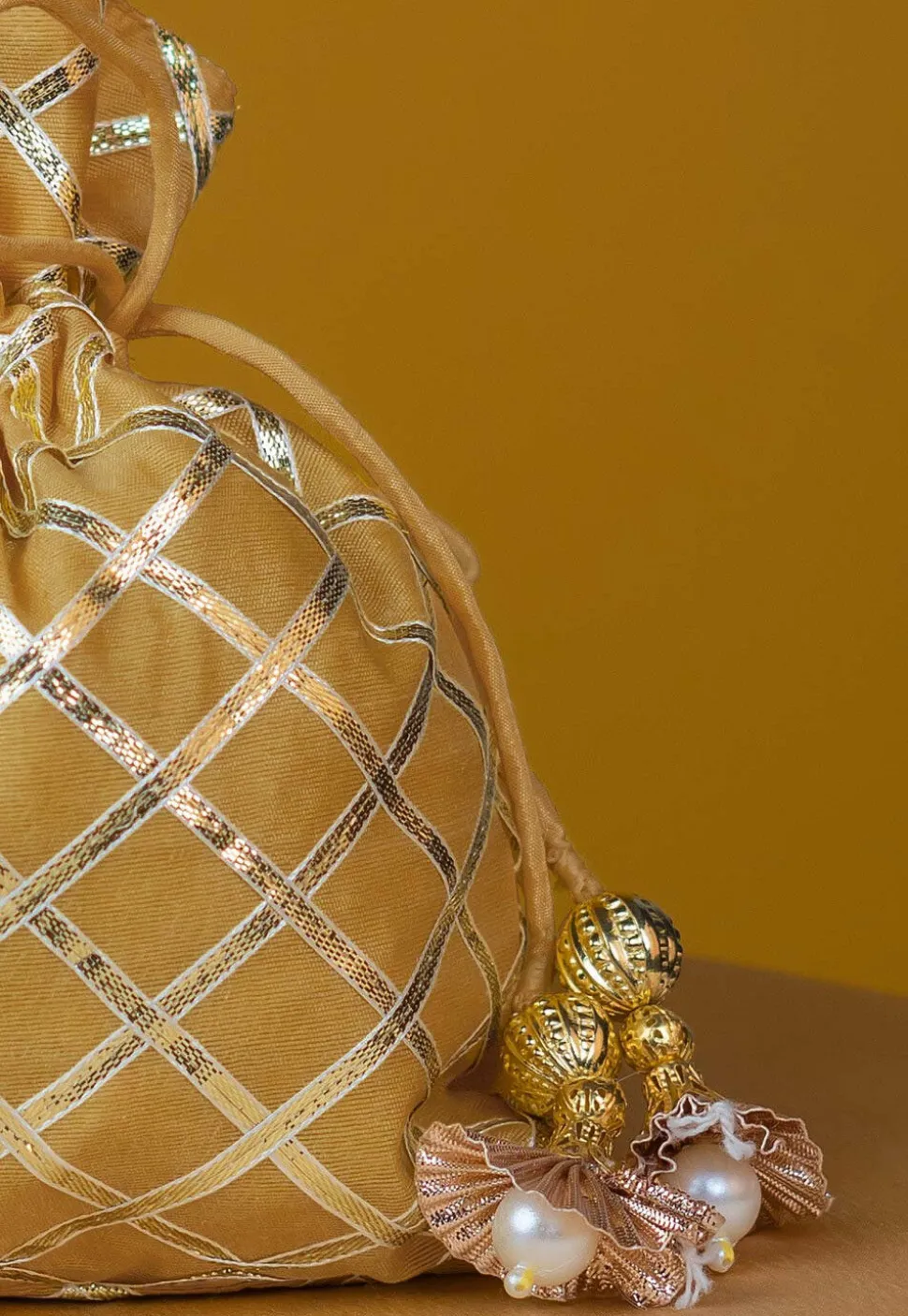 Embroidered Art Silk Potli Bag in Beige