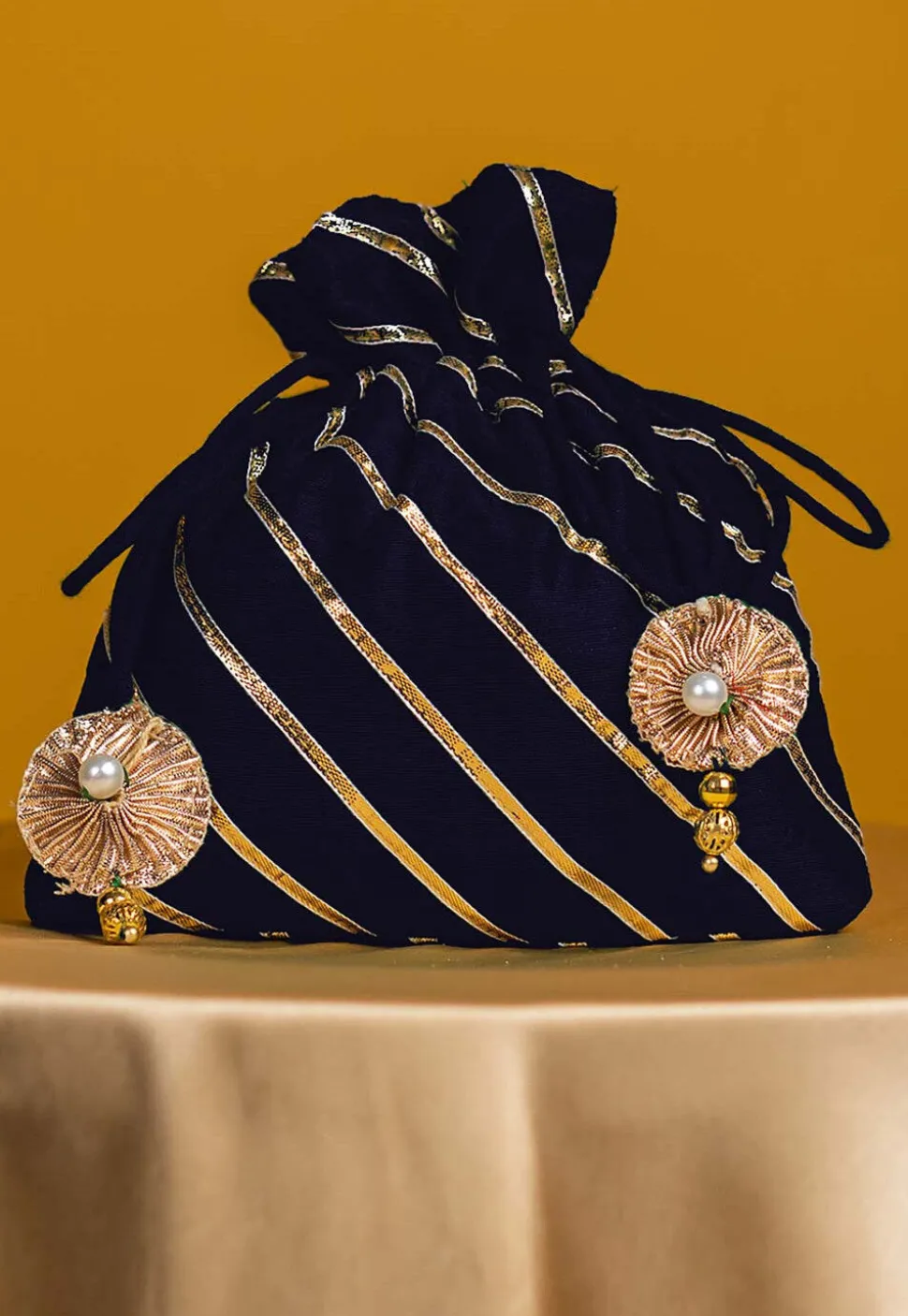Embroidered Art Silk Potli Bag in Navy Blue