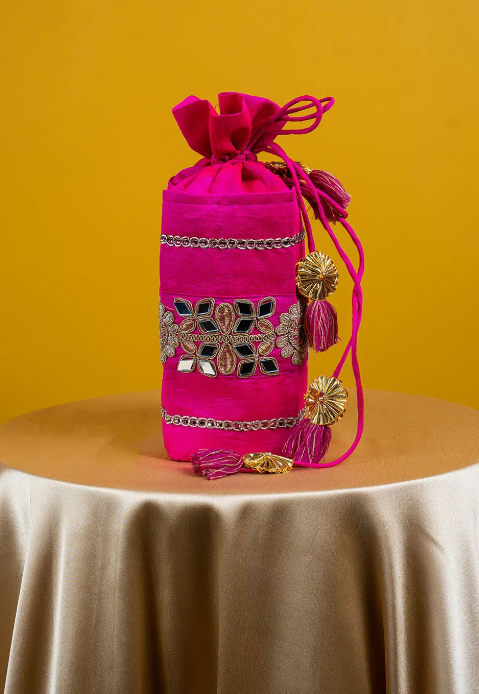 Embroidered Art Silk Potli Bag in Fuchsia