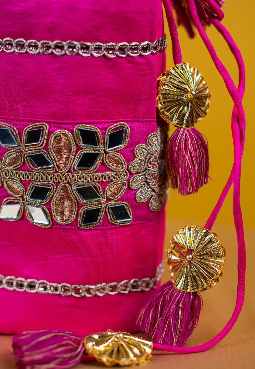 Embroidered Art Silk Potli Bag in Fuchsia