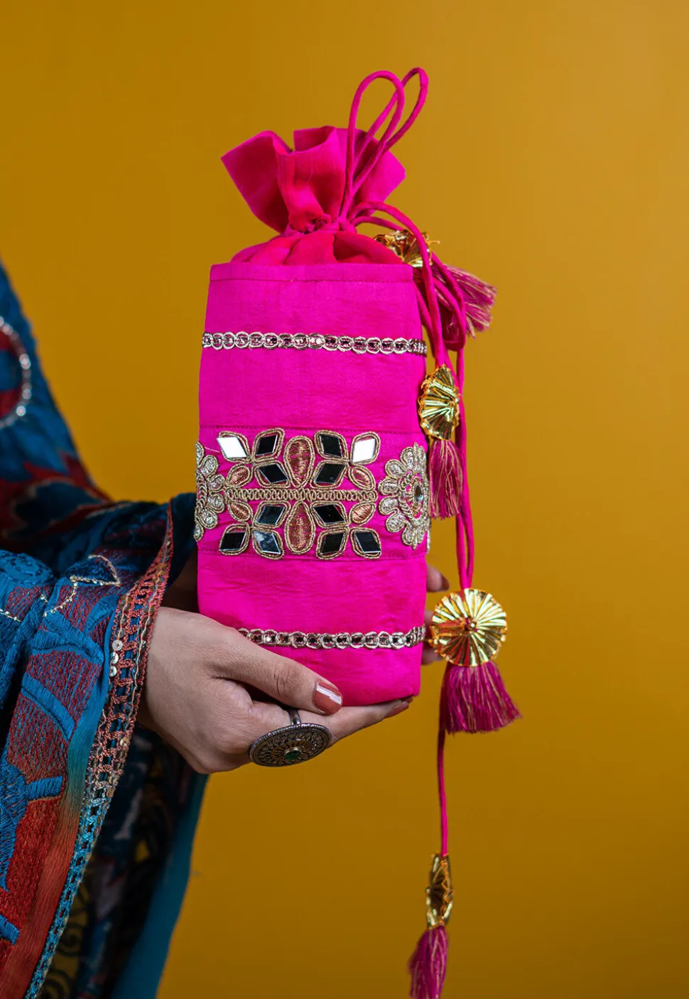 Embroidered Art Silk Potli Bag in Fuchsia
