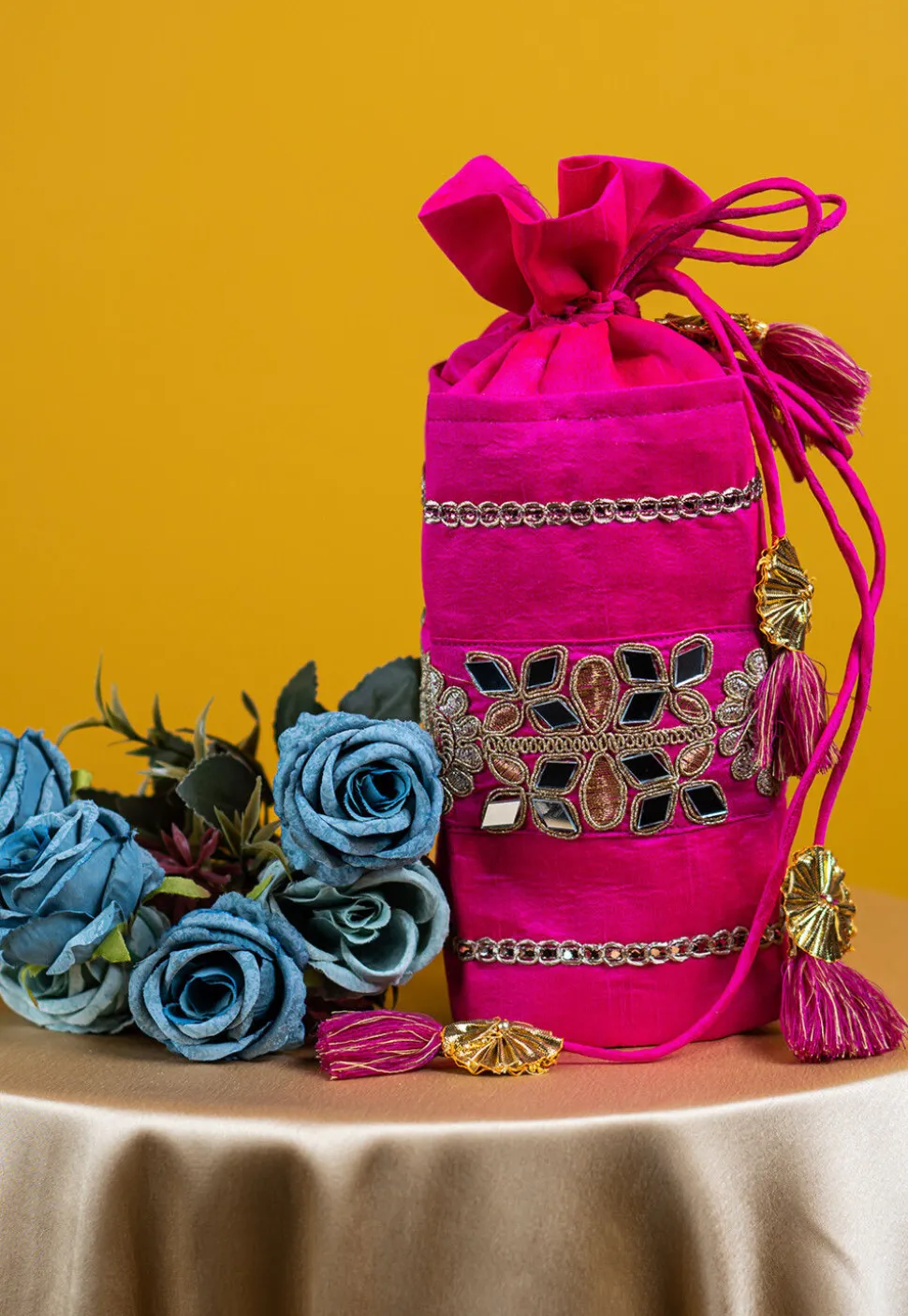 Embroidered Art Silk Potli Bag in Fuchsia
