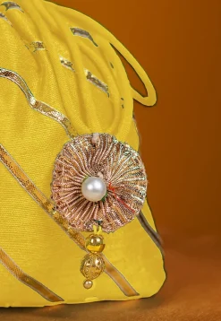 Embroidered Art Silk Potli Bag in Yellow