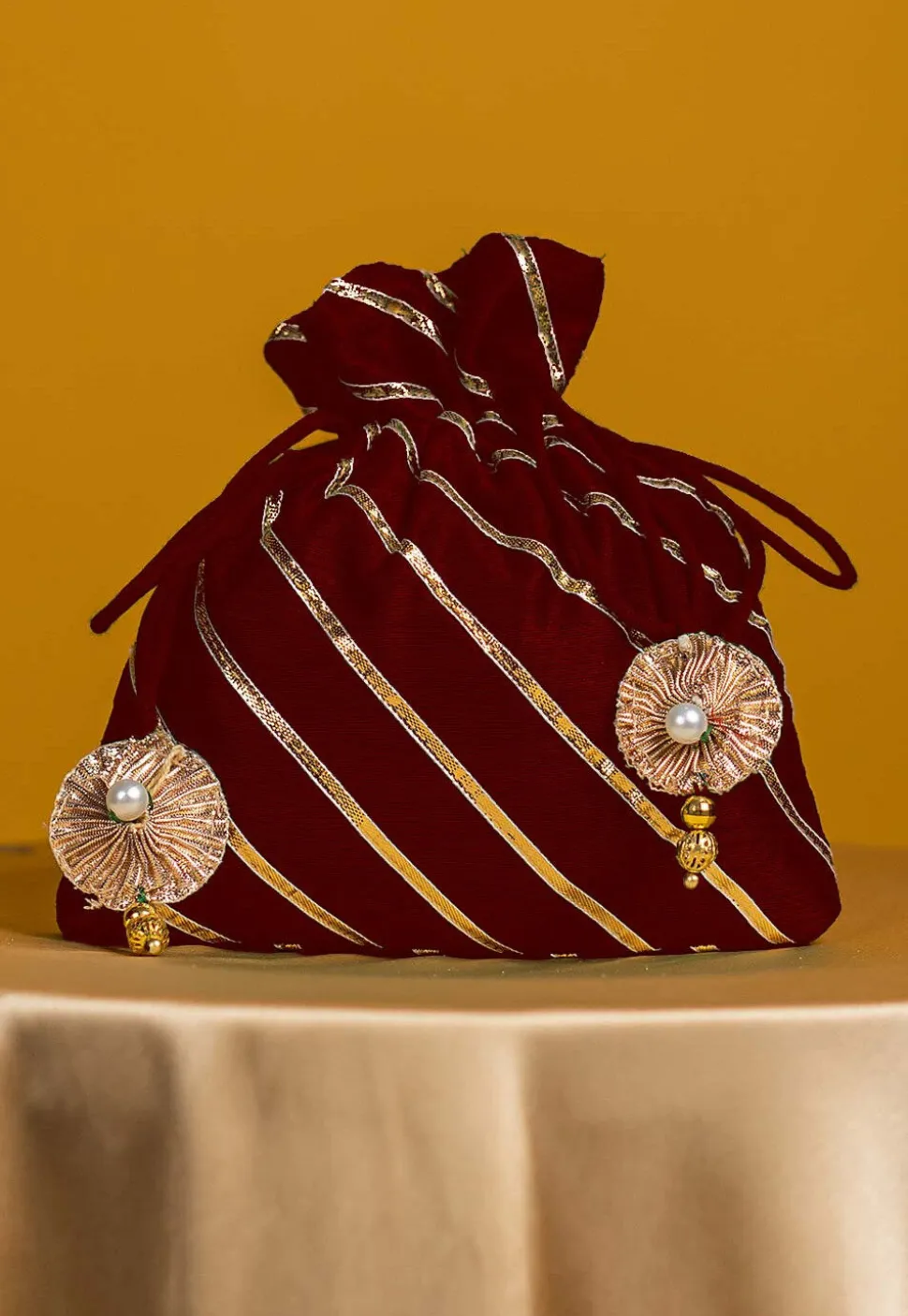 Embroidered Art Silk Potli Bag in Maroon