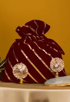Embroidered Art Silk Potli Bag in Maroon