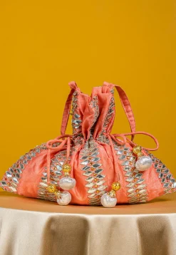 Embroidered Art Silk Potli Bag in Peach