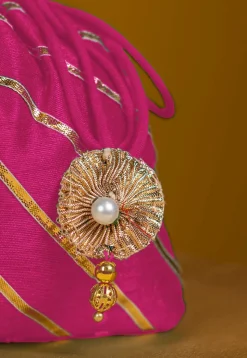 Embroidered Art Silk Potli Bag in Pink