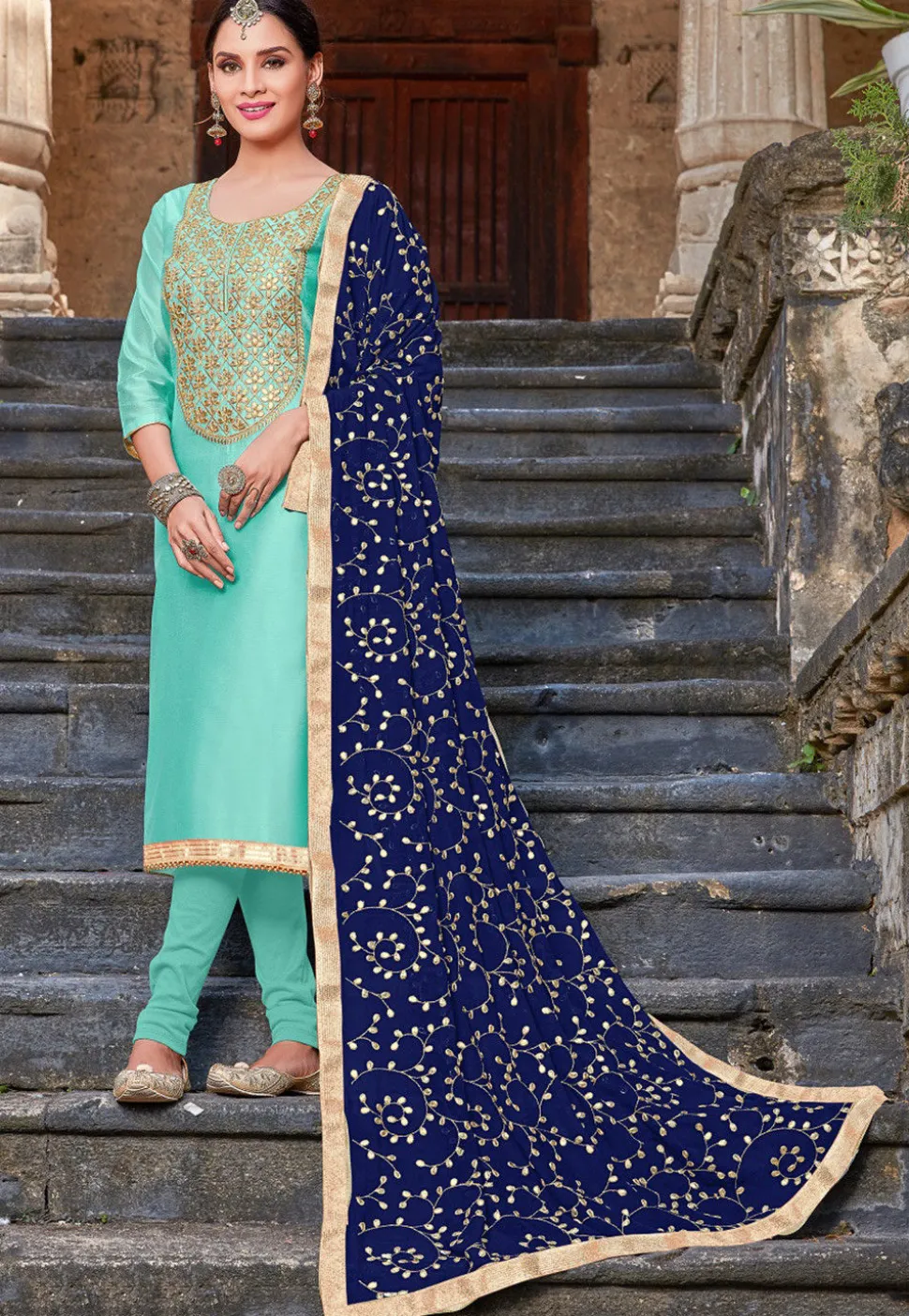 Embroidered Art Silk Straight Suit in Turquoise