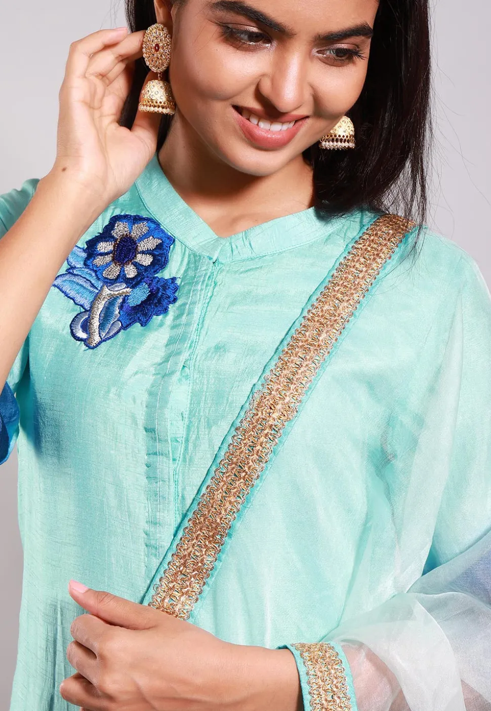 Embroidered Art Silk Straight Suit in Turquoise