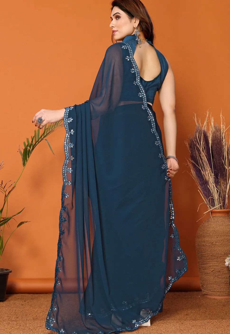 Embroidered Border Georgette Saree in Dark Teal Blue