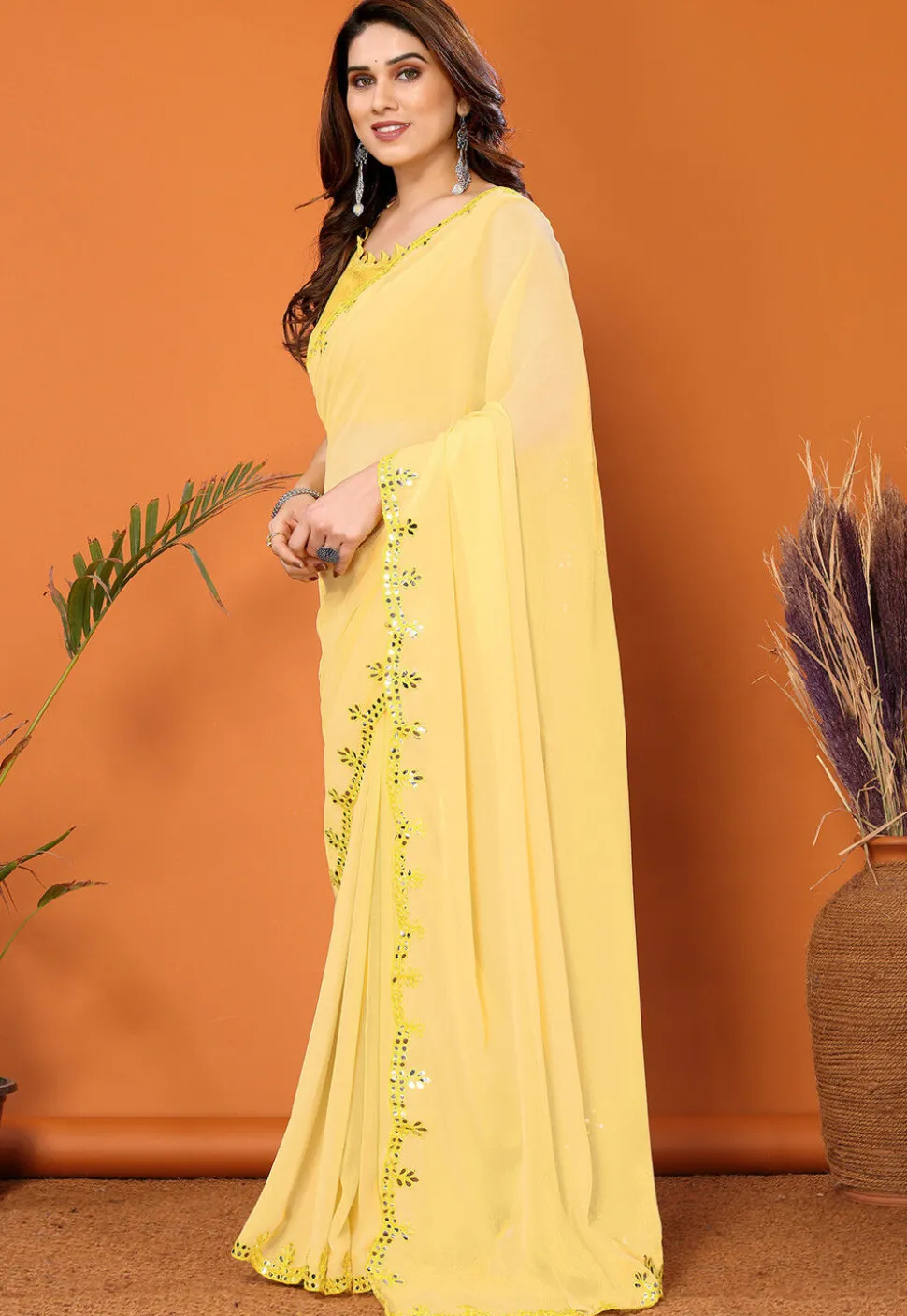 Embroidered Border Georgette Saree in Yellow