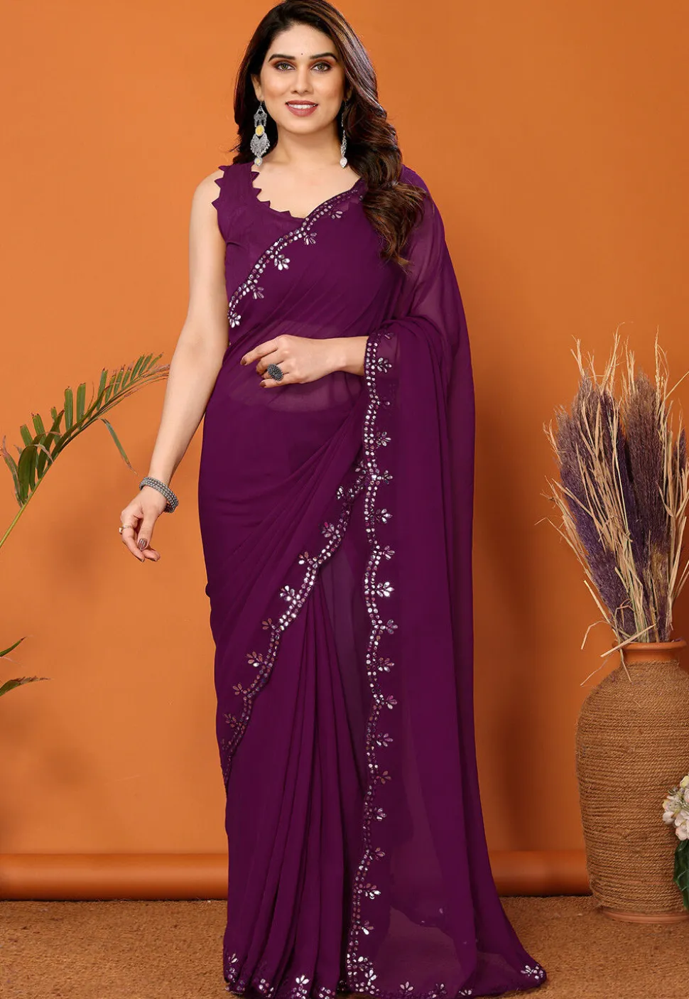 Embroidered Border Georgette Saree in Dark Purple