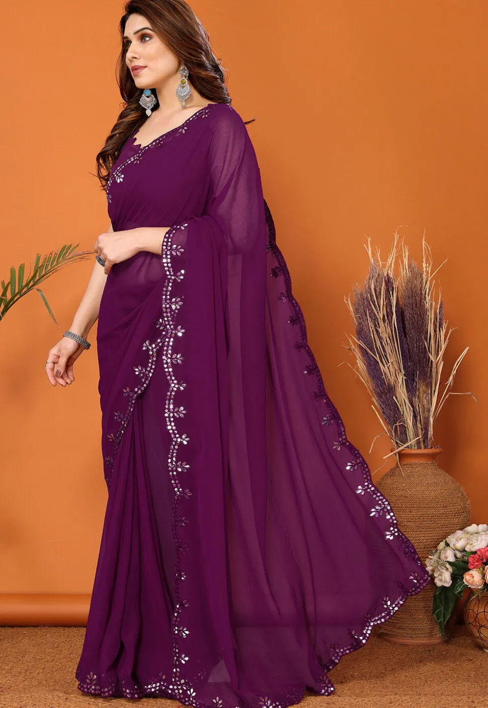 Embroidered Border Georgette Saree in Dark Purple