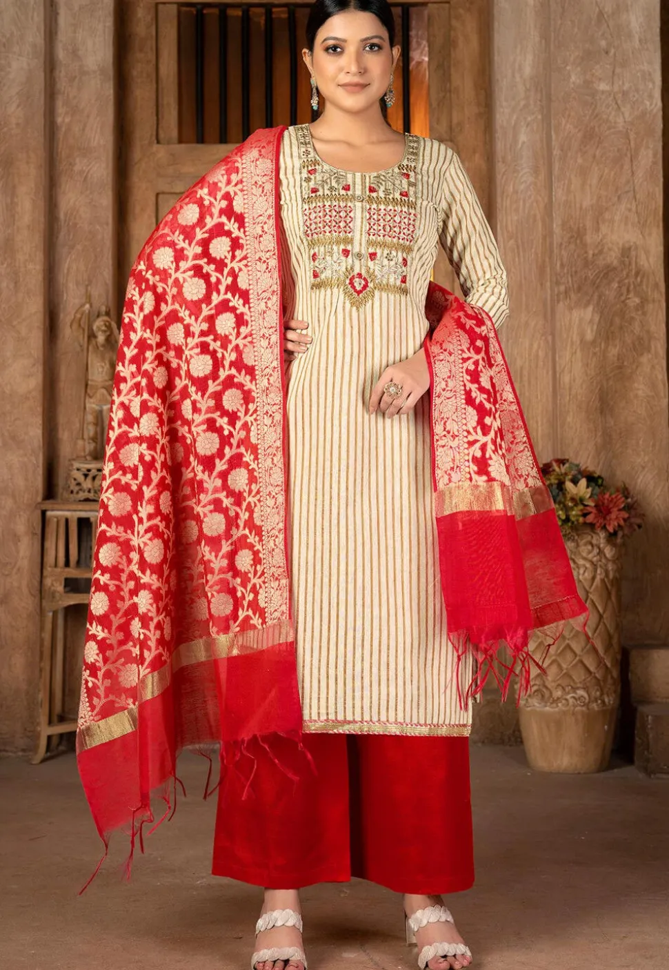 Embroidered Cambric Cotton Pakistani Suit in Beige