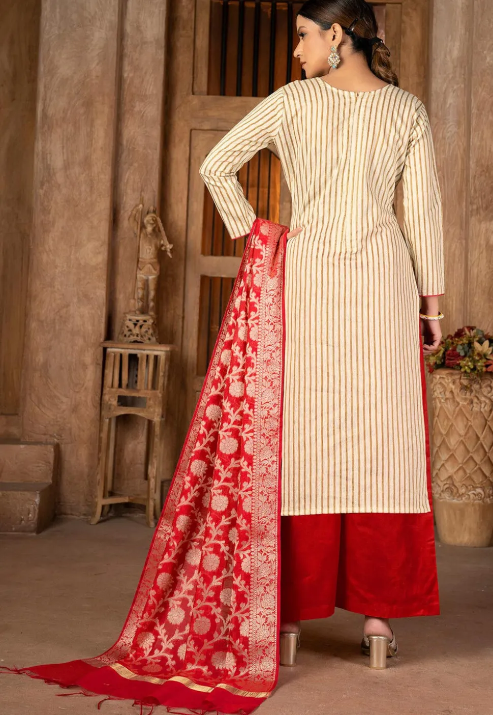 Embroidered Cambric Cotton Pakistani Suit in Beige