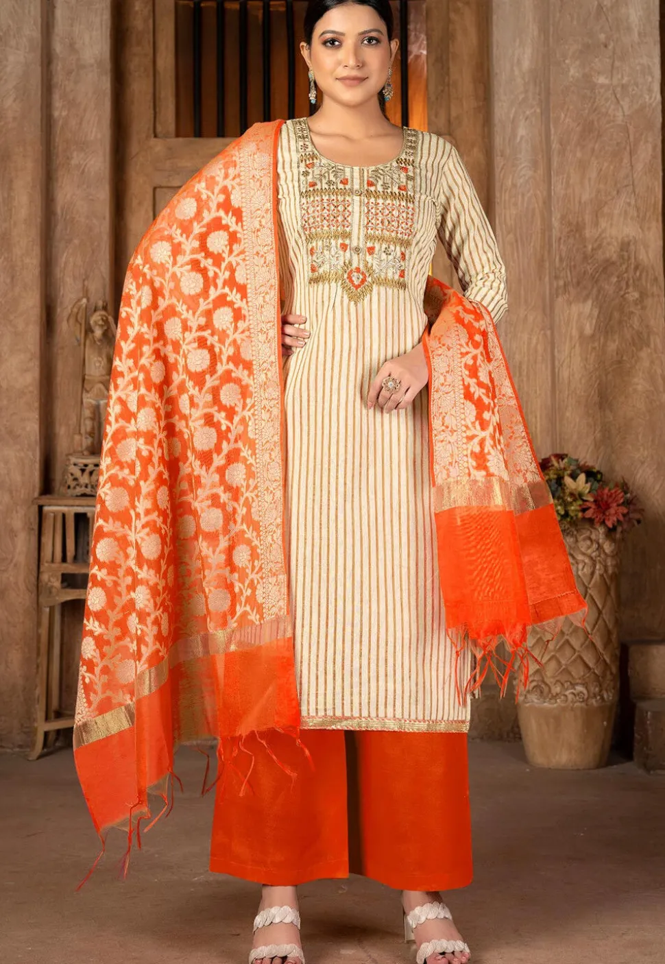 Embroidered Cambric Cotton Pakistani Suit in Beige