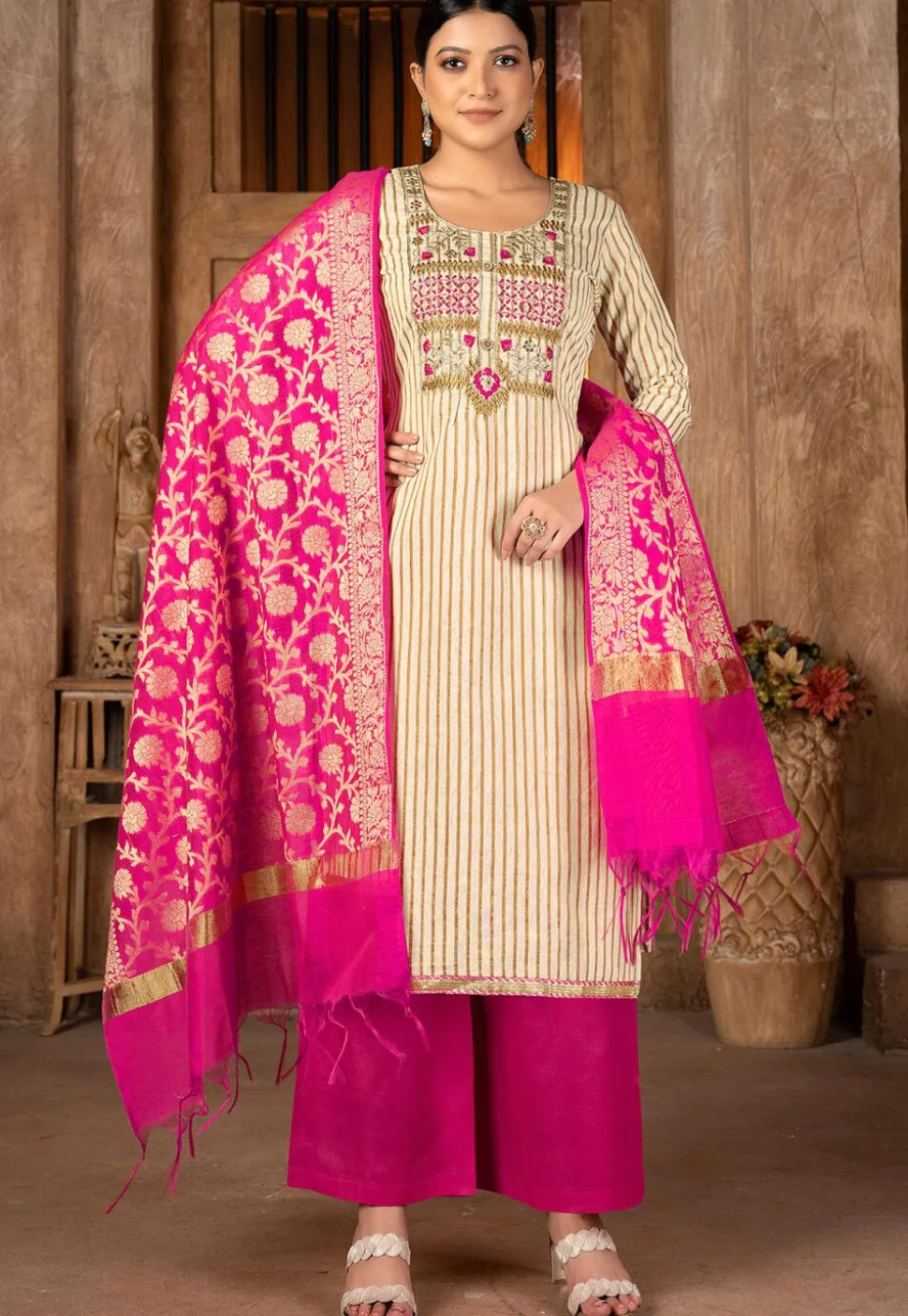 Embroidered Cambric Cotton Pakistani Suit in Beige