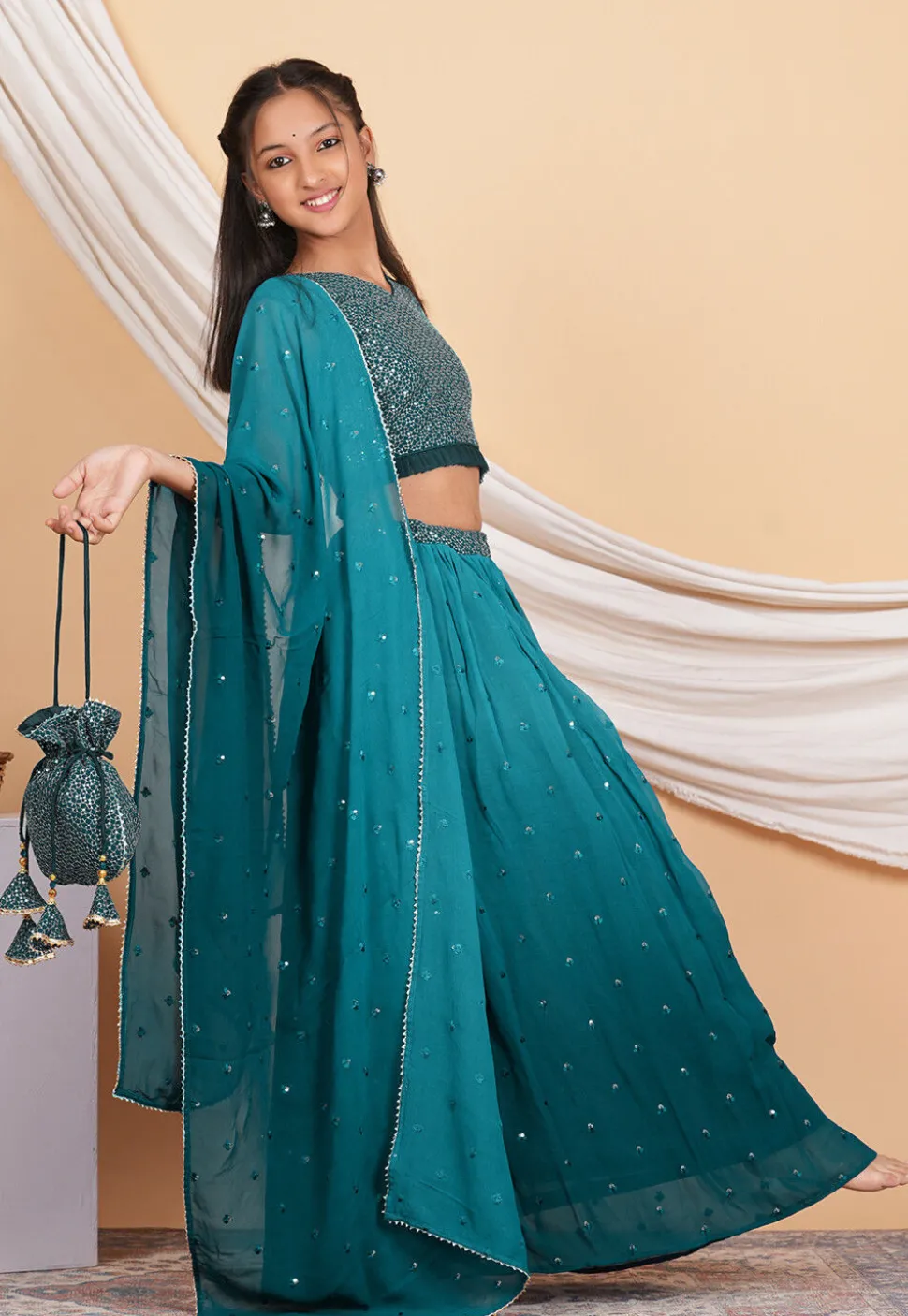Embroidered Georgette Lehenga in Shaded Teal Blue