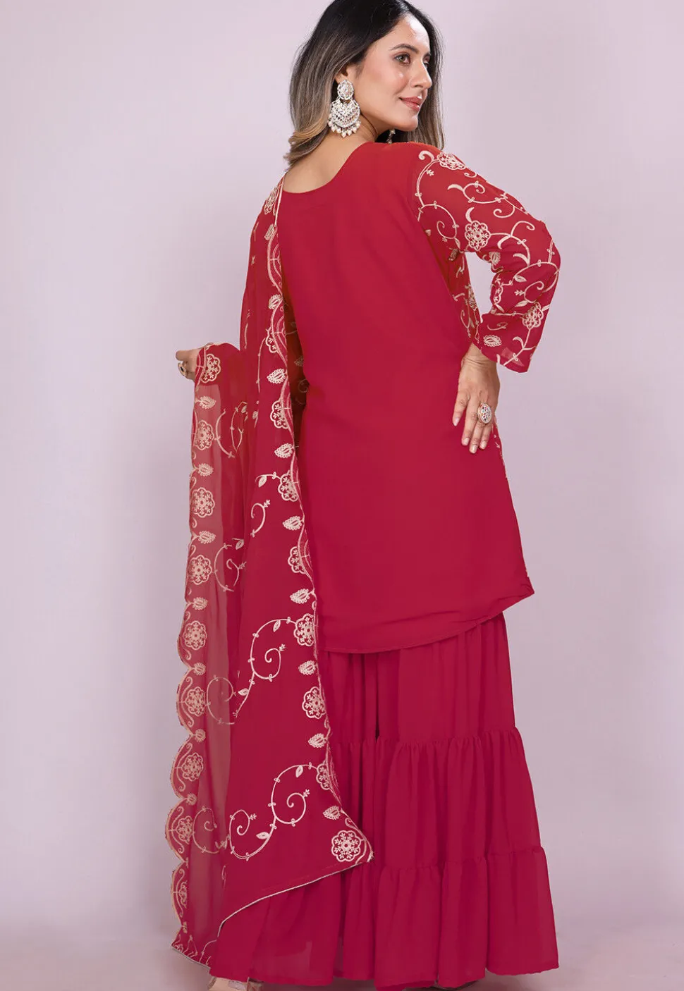 Embroidered Georgette Pakistani Suit in Fuchsia