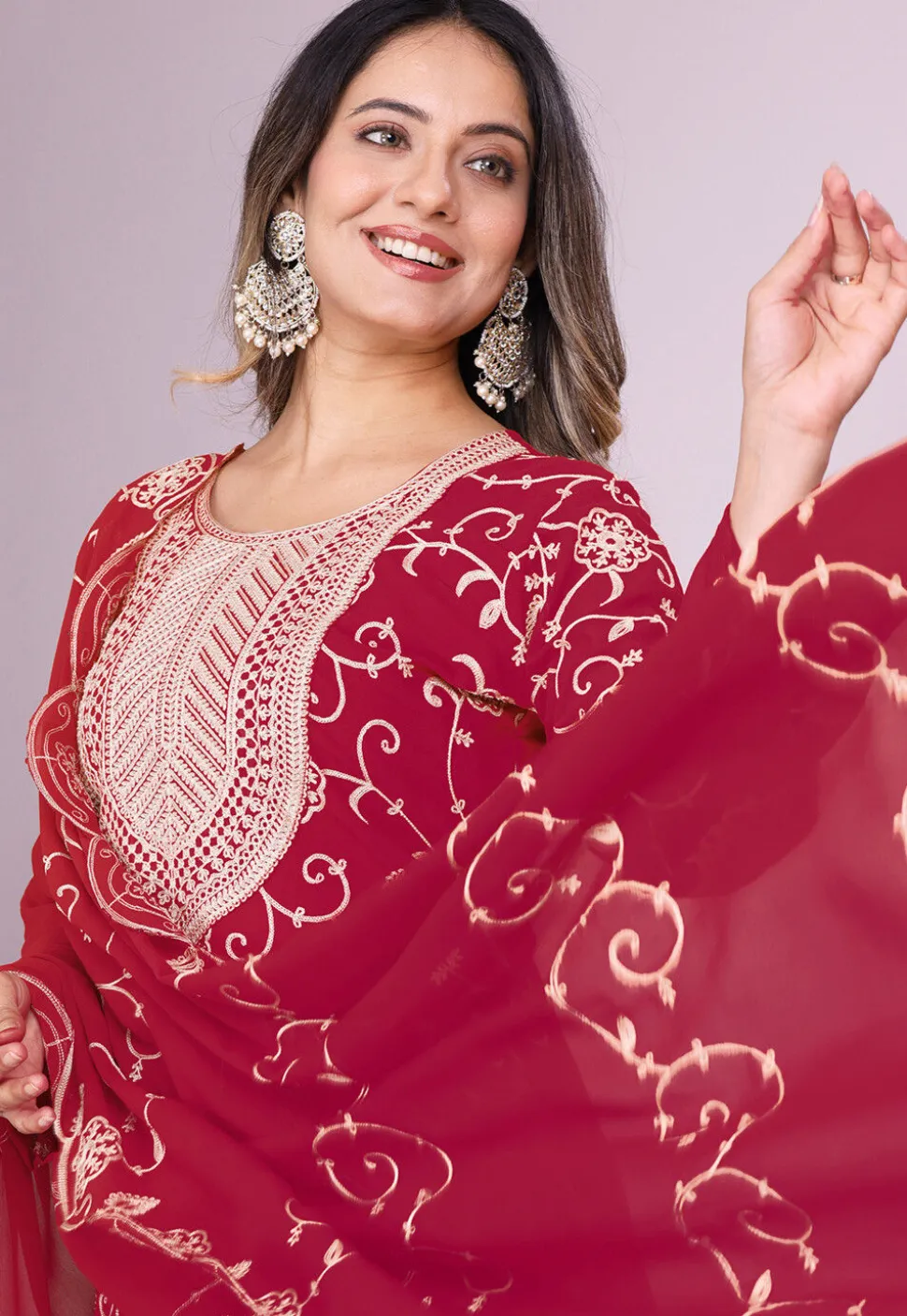 Embroidered Georgette Pakistani Suit in Fuchsia